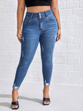 Taglie Forti Jeans skinny strappati vita alta