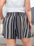 Taglie Forti Shorts con gamba ampia con stampa geo e slogan