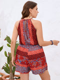 Taglie Forti Tutina con stampa floreale con collo halter