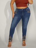 Jeans skinny bordo grezzo con perline